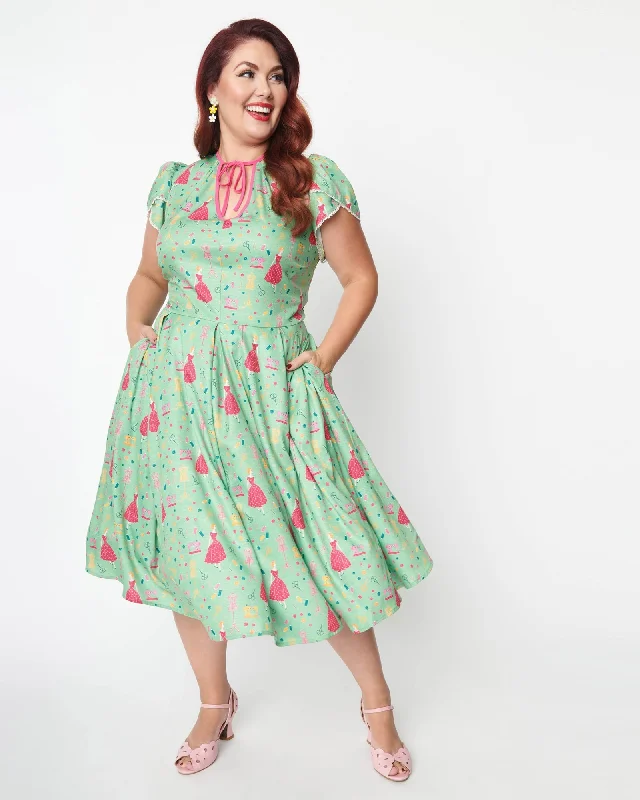 Unique Vintage Sage & Retro Sewing Print Dahlia Swing Dress | Green